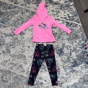 Adidas’s jogging suit.